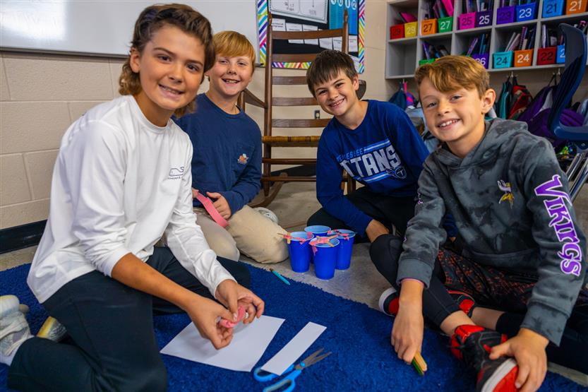 Students do a pumpkin STEM challenge